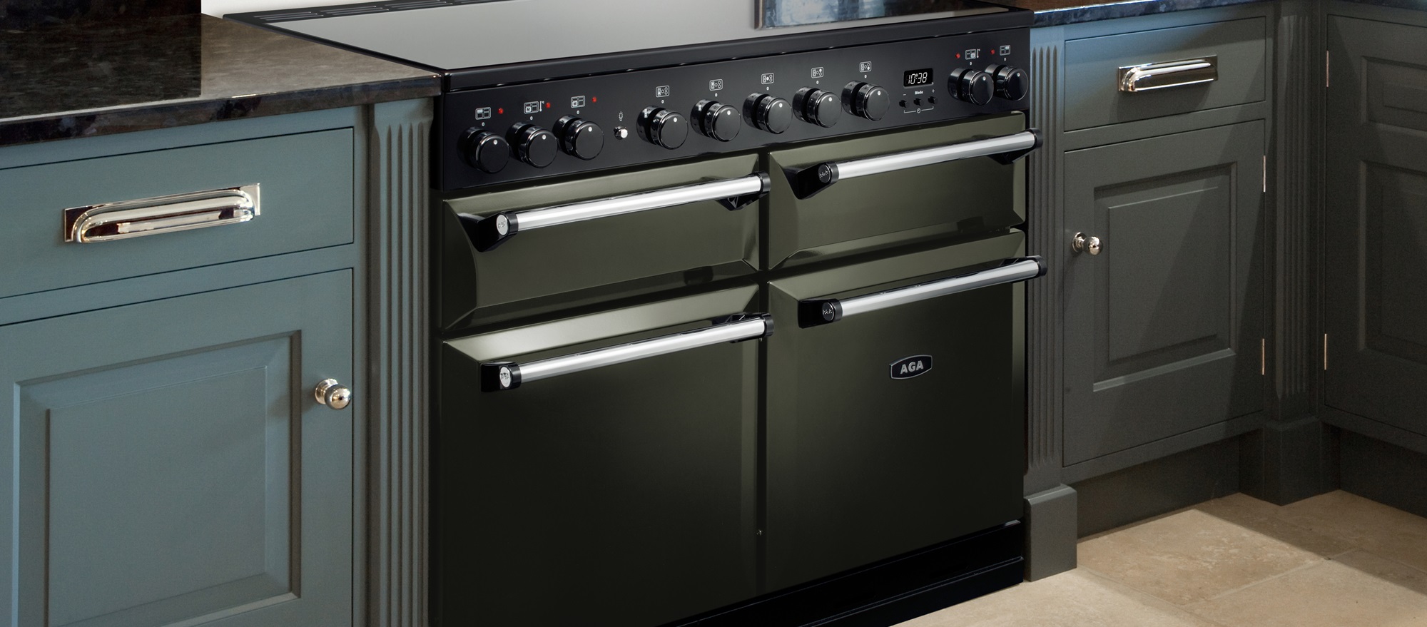 AGA Masterchef Deluxe 110 in Pewter finish in blue-green kitchen.