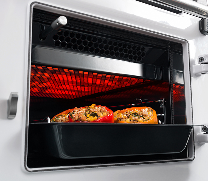 Stuffed peppers under the infrared grill.